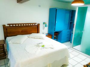 Voodi või voodid majutusasutuse Buen Retiro Apart Hotel toas