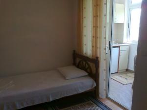 Postel nebo postele na pokoji v ubytování Guesthouse Sinani