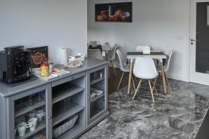 Kuchnia lub aneks kuchenny w obiekcie Xabarin Rooms