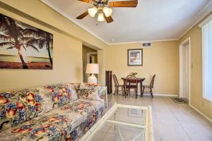 a living room with a couch and a table at Ideally Located Abode with Gazebo in Pompano Beach! in Pompano Beach