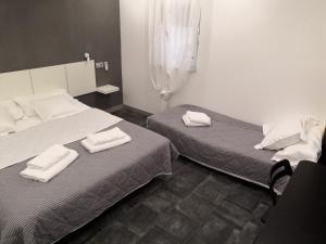 Cama o camas de una habitación en ASV Apartments