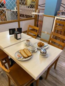 a table with two plates of food on it at Anaco in Madrid