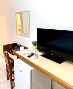 Billede fra billedgalleriet på Amarilis Flat Service i Riviera de São Lourenço