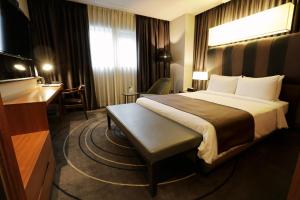 Postel nebo postele na pokoji v ubytování Best Louis Hamilton Hotel Haeundae