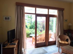 TV a/nebo společenská místnost v ubytování Tasman Farmstay Retreat GlenMhor