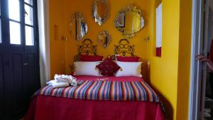 Uma cama ou camas num quarto em Dar Sultan