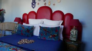 Uma cama ou camas num quarto em Dar Sultan