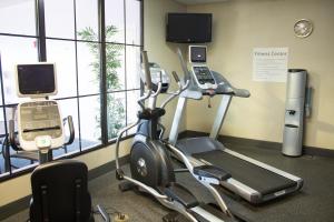 a gym with two exercise bikes and a treadmill at Holiday Inn Express West Jefferson, an IHG Hotel in West Jefferson