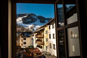 a view from a window of a town at Roomie Alps Design Hostel in Kitzbühel