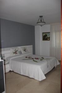 Posteľ alebo postele v izbe v ubytovaní Palm Beach Sea
