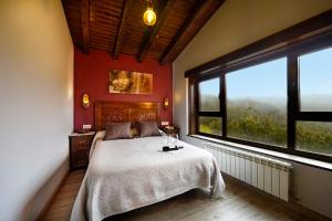 Llit o llits en una habitació de Hotel Tejera del Nalon