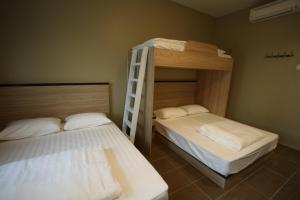 Postel nebo postele na pokoji v ubytování Shamrock Greenhill