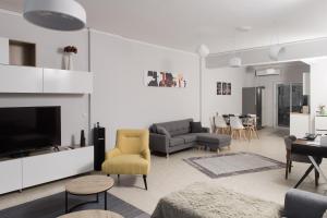 Coin salon dans l'établissement nelion 01 - a DREAM apartment with amazing view
