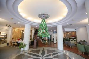 Area lobi atau resepsionis di Liberty Hotel Saigon Parkview