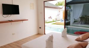 Bazén v ubytování Montecarlo Villas Panglao nebo v jeho okolí