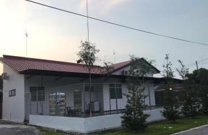 a white house with a red roof at BELLE VILLE in Muar +8 photos