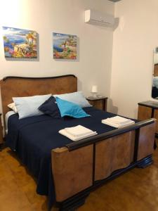 Posteľ alebo postele v izbe v ubytovaní Villa Carolea