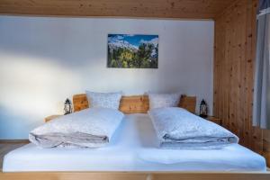 Posteľ alebo postele v izbe v ubytovaní Bergbauernhof Pabulariu
