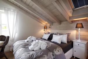 Postel nebo postele na pokoji v ubytování Ferienhaus Nest