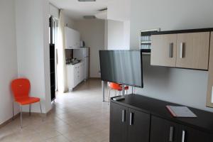 
A kitchen or kitchenette at Tropicana Residence
