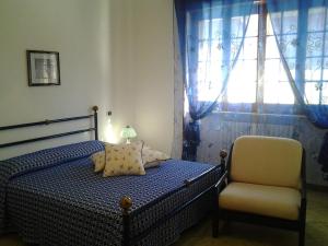 En eller flere senge i et værelse på La Baronessa