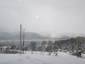 Obiekt Domki Piecykowo zimą