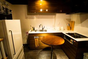 Eldhús eða eldhúskrókur á R Hostel Namba south