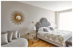 Llit o llits en una habitació de La Chèvre d'Or