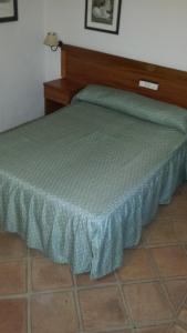 Postel nebo postele na pokoji v ubytování Hotel Rural Casares