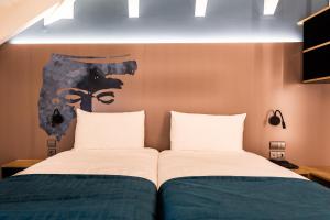 
A bed or beds in a room at ibis Styles Chaves
