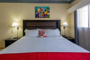 Voodi või voodid majutusasutuse Baker's Suites toas