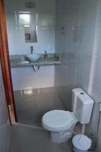 Ett badrum på Casa Praia do Pontal 1Q