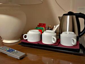 Принадлежности для чая и кофе в Casa REGINA MONTIS REGALIS