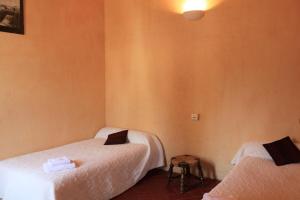 Postel nebo postele na pokoji v ubytování A Spelunca