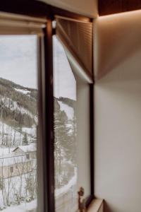 Nespecifikovaný výhled na hory nebo výhled na hory při pohledu z apartmánu