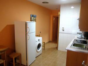 Una cocina o zona de cocina en Apartamentos Almagro