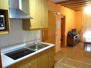 Una cocina o zona de cocina en Apartamentos Almagro