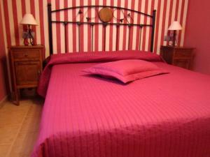 Cama o camas de una habitación en Apartamentos Almagro