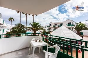 Rõdu või terrass majutusasutuses Vivienda Vacacional Malu