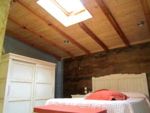 Cama o camas de una habitación en Apartamentos Almagro