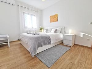 Een bed of bedden in een kamer bij Apartment Artemis