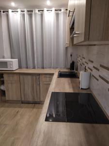 Kuchyňa alebo kuchynka v ubytovaní Apartament KAOLA