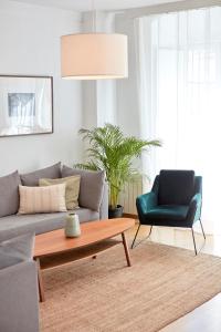 Apartamentos La Bola Suite的休息区