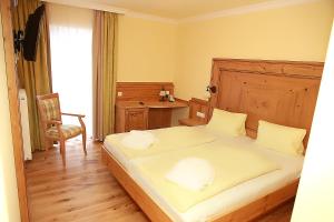 Posteľ alebo postele v izbe v ubytovaní Hotel Kornock