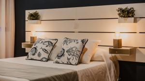
Cama o camas de una habitación en La Pardela Experience Apartamentos
