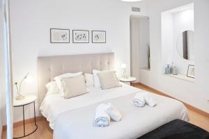 Apartamentos La Bola Suite客房内的一张或多张床位