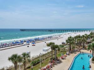 a view of a beach with a pier at Calypso Beach Resort Towers in Panama City Beach