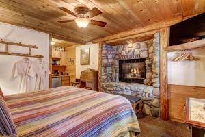 A bed or beds in a room at Heavenly Valley Lodge