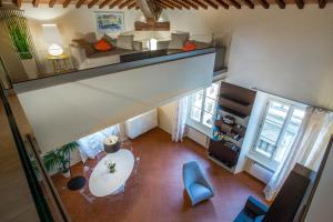 A seating area at Le Residenze a Firenze - Residenza Covoni Apartment in the historical center of Florence