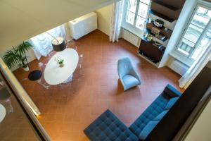 A seating area at Le Residenze a Firenze - Residenza Covoni Apartment in the historical center of Florence